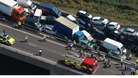 Emergency services swarm across the bridge after the crash.