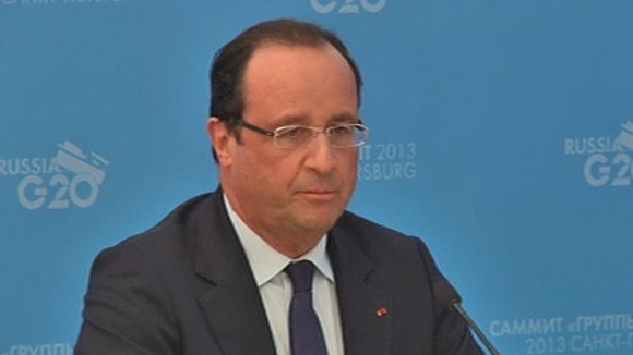 French President Francois Hollande speaking at a press conference.