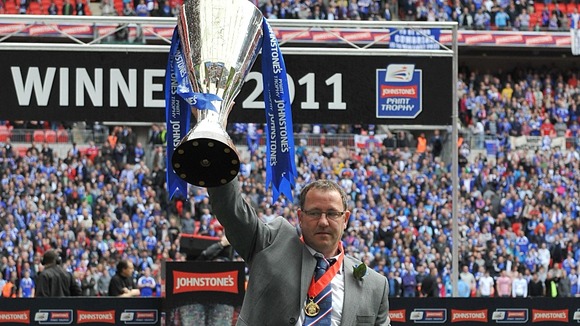 Former Carlisle manager Greg Abbott with the Johnstones' Paint Trophy in 2011.