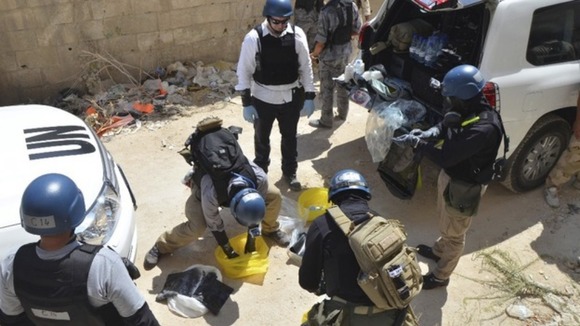 UN chemical weapons experts collecting samples in Syria.