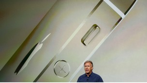 Apple's Philip Schiller introduces the iPhone 5S at a media event in California