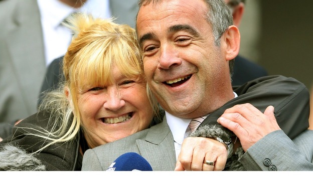 Coronation Street actor Michael Le Vell smiles with his sister Sue after he was cleared of all charges.