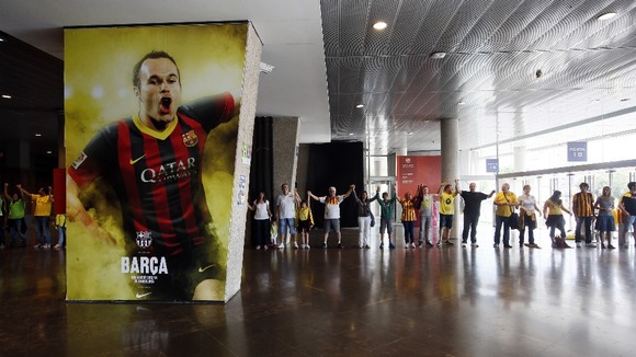 Catalan separatists form a human chain through the Nou Camp stadium in Barcelona