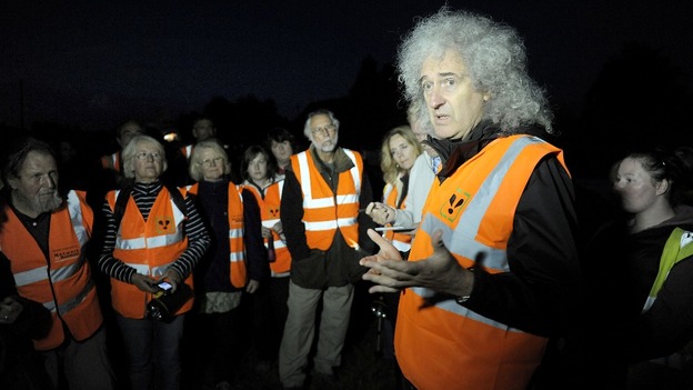 Queen guitarist Brian May addresses members of a Wounded Badger Patrol in Gloucestershire