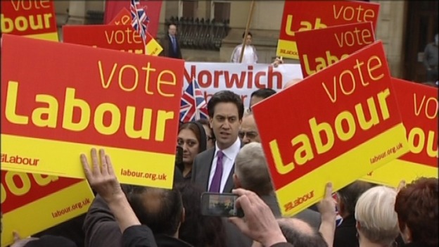 Labour leader Ed Miliband among the placards