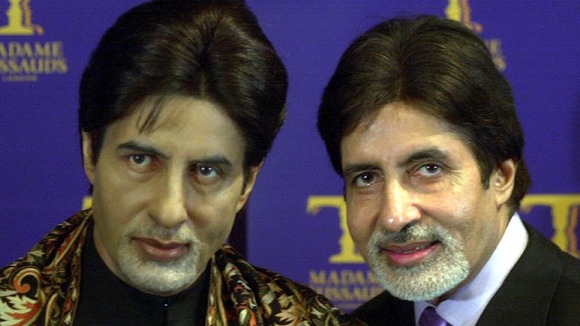 Amitabh Bachchan, one of the stars of Sholay, poses with his waxwork at Madame Tussauds