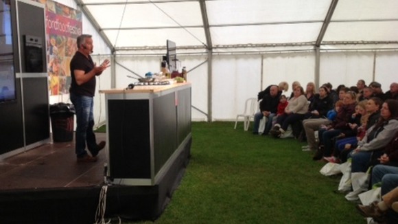 Paul Hollywood carries out a cooking demonstration at the Stratford Food Festival