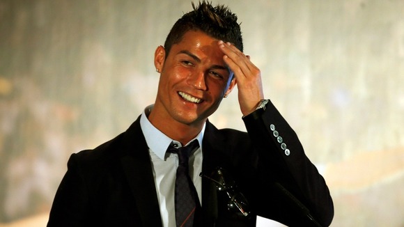 Real Madrid's Cristiano Ronaldo speaks during a ceremony at Santiago Bernabeu stadium.