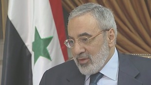 Syria's information minister Omran al-Zoubi speaks to ITV News' Bill Neely.