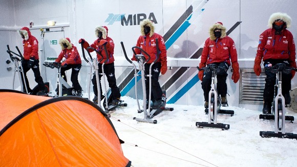 Prince Harry and the team practice skiing in the cold chamber.