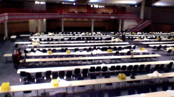 Empty tables and chairs at the ICC in Birmingham