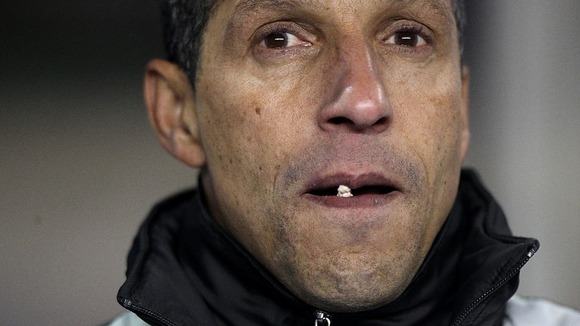 Chris Hughton watches his Birmingham team play football