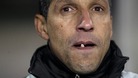 Chris Hughton watches his Birmingham team play football
