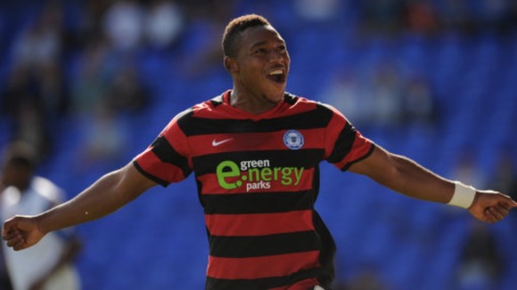 Peterborough United striker Britt Assombalonga has been awarded the Football League's Young Player of the Month award