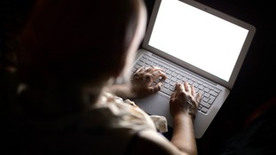 File photo of a female using a laptop computer.