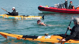 Swimmer Anna Wardley with support boats