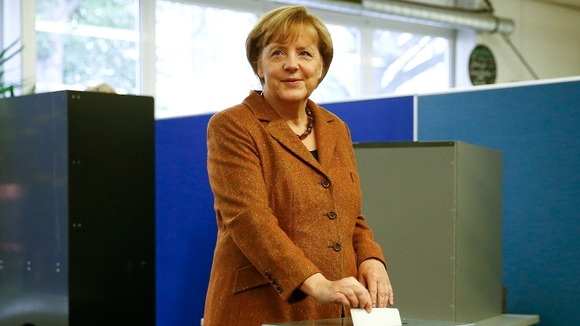 German Chancellor and election candidate Angela Merkel casting her vote