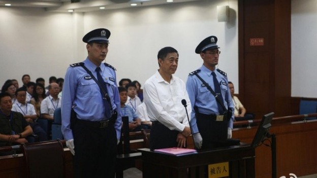 Disgraced Chinese politician Bo Xilai standing trial inside the court in Jinan, Shandong province.