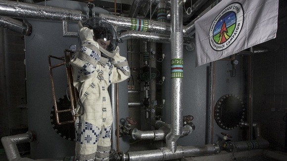 Suiting up: Hefin Jones' space suit is made from Welsh wool - and contains a pressure system made by a Welsh plumber.