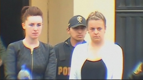 Michaella McCollum Connolly (L) and Melissa Reid being taken from prison to a court hearing.