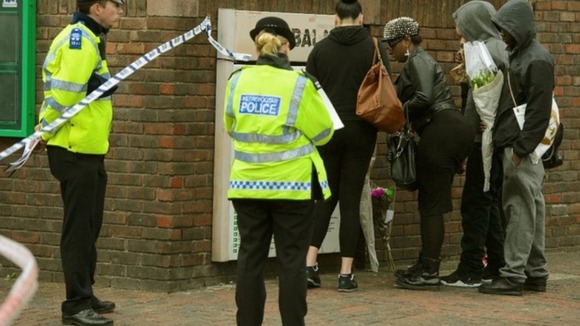 Tributes being laid at the scene of the shooting last week