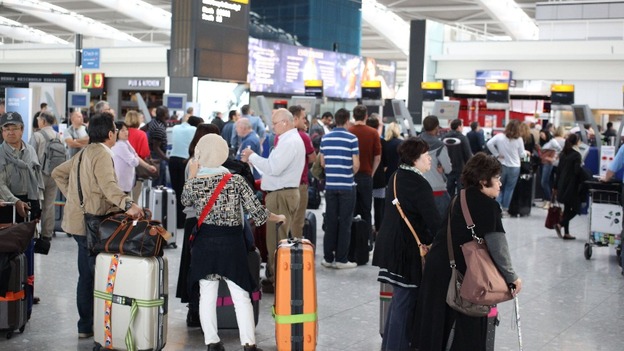 Queues form as British Airways' passengers with check-in luggage were unable to fly