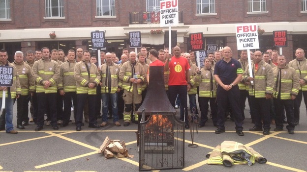 Dozens of firefighters gathered outside Leicester Fire Station