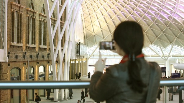 Early morning commuters at the new square in Kings Cross