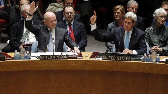 Foreign Secretary William Hague and US Secretary of State John Kerry vote to eradicate Syria's chemical arsenal.