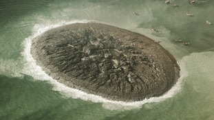 A close-up photo of the surface of the new island