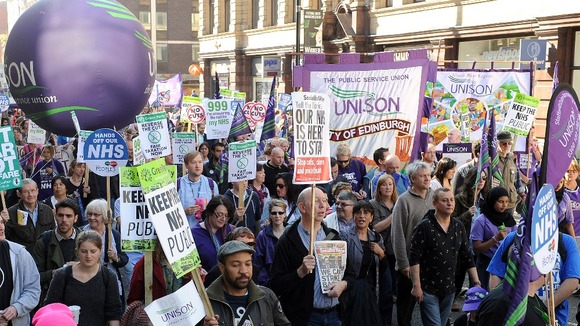 Protesters outside the Conservative Party Conference in Manchester Central.