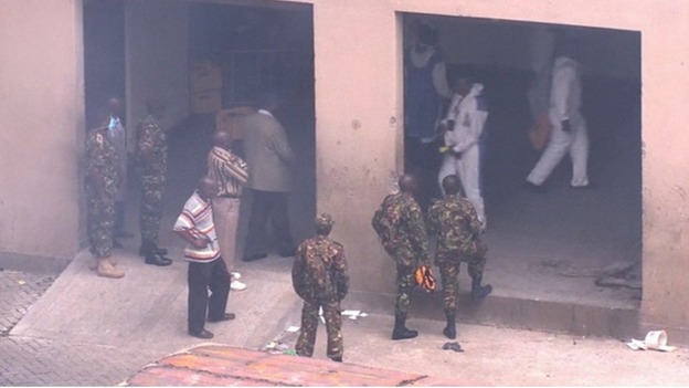 Kenyan soldiers and forensic officers scour the shopping centre in Nairobi for clues