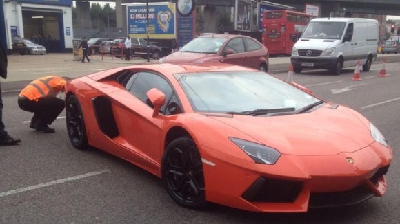Lamborghini being seized by police in Newham
