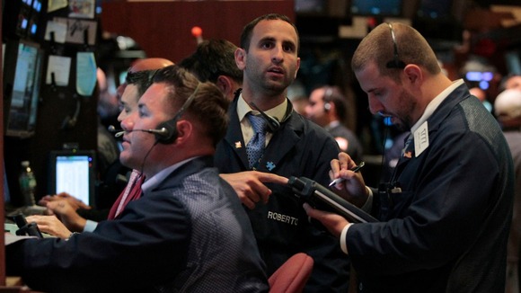 Traders working at the New York Stock Exchange the last time the US came close to a default in August 2011