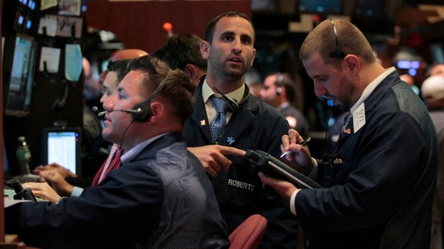 Traders working at the New York Stock Exchange the last time the US came close to a default in August 2011