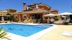 House with a pool in the sun