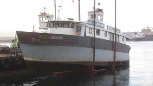 The Allen Gardiner being craned out of the water in Durban