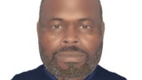 The body was fully clothed in a dark blue fleece with beige shirt