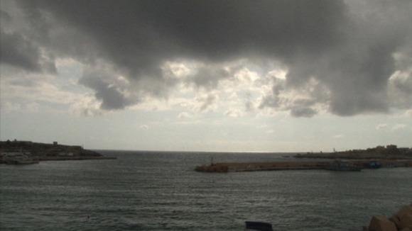 Weather conditions on the Italian island of Lampedusa have forced rescuers to abandon their search.