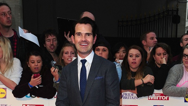 Comedian Jimmy Carr smiles as he arrives for the 15th Annual Pride of Britain awards.