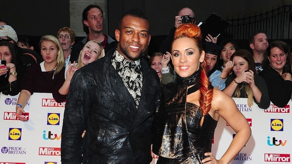 Oritse Williams and AJ Azarie arriving at the awards at Grosvenor House.