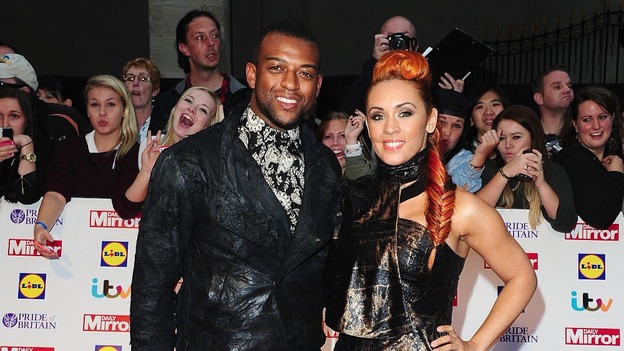 Oritse Williams and AJ Azarie arriving at the awards at Grosvenor House.