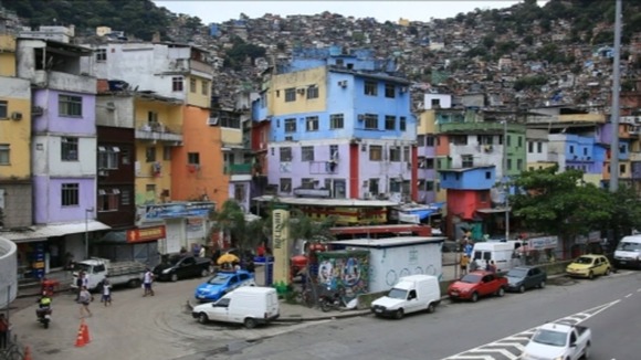 Brazil's police dawn raids attempt to tame the favelas.