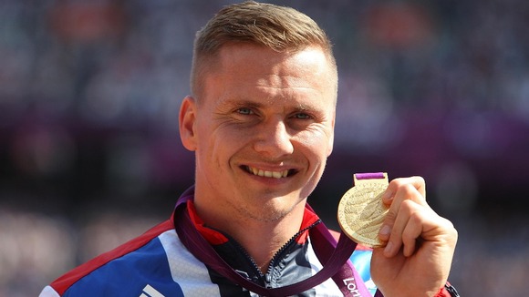 David Weir with his gold medal after winning the Men's 5000m - T54 at the Olympic Stadium, London