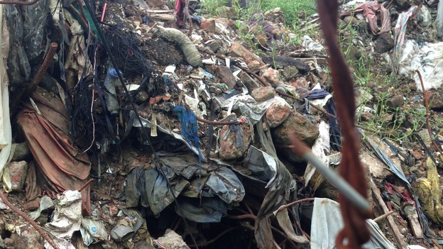 The rubble of the Rana Plaza factory still litters the ground in a manufacturing district of Dhaka, Bangladesh.