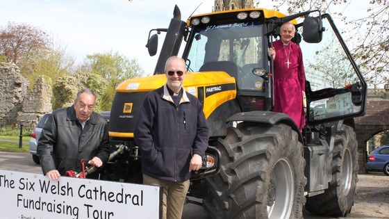 Tractor and men of the church
