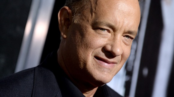 Tom Hanks arrives at the premiere of Captain Phillips in Los Angeles.