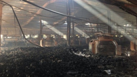 Smouldering balls of yard litter floor of the garment factory
