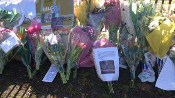 Floral tributes left outside Hannah's school in Wilmslow