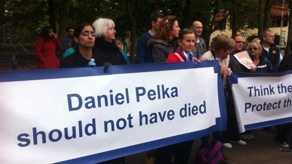 Protesters have gathered with banners outside Coventry council house